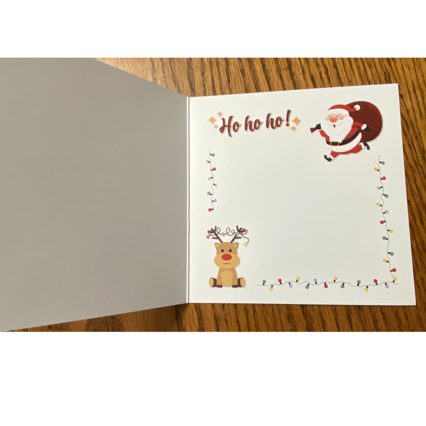 Blank Christmas Greeting Card with Santa, reindeer and lights
