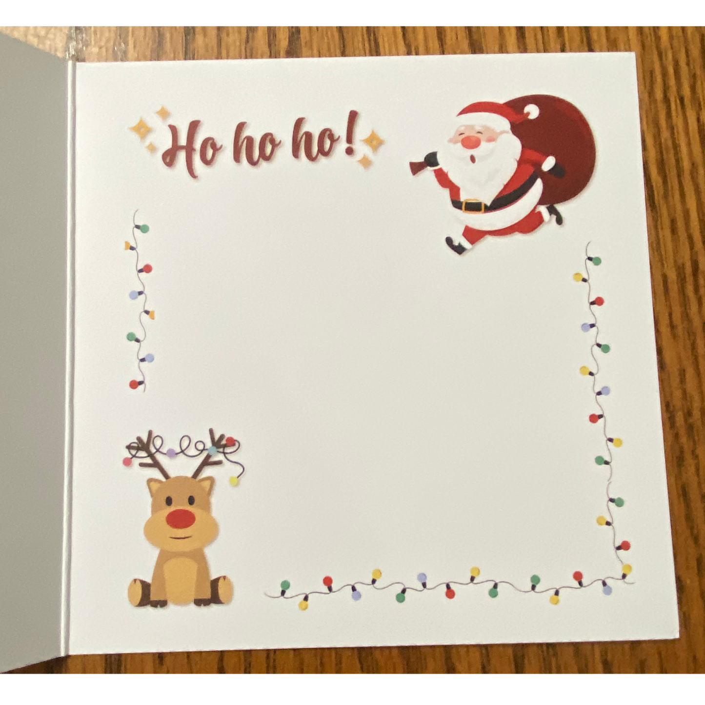 Blank Christmas Greeting Card with Santa, reindeer and lights
